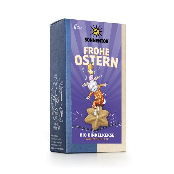 On the label, the Easter Bunny rides on an Easter cookie like a circus performer on a unicycle on a rope, balancing Easter eggs and an apricot on his head.